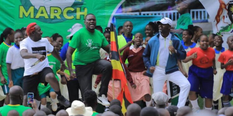 Joseph Masembe, the founder of Little Hands Go Green with Deputy Speaker Thomas Tayebwa and the kids