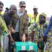 Moses Kintu the Assitant ONC communications Manager while handing over wealth Creation items to the youth in Mpigi District