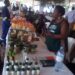 An organic products exhibitor explaining her products to customers at Hotel Africana on Tuesday