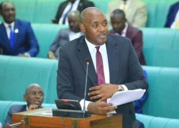 The Minister of Information, Communication Technology and National Guidance, Chris Baryomunsi on the Floor of the House on Wednesday, 06 December 2023