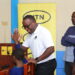 Brian-Mbasa-Senior-Manager-MTN-Foundation-talks-to-learners-of-Hornby-High-School-Junior-as-they-use-computers-courtesy-of-the-telecom-comapny-to-stir-digital-skills-among-learners