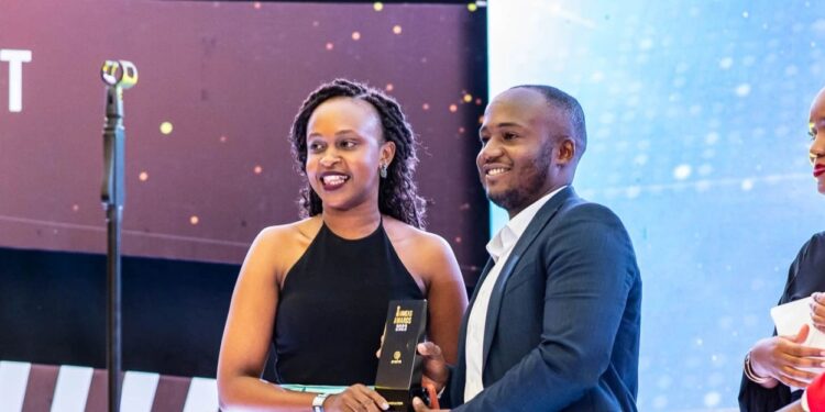 Airtel Money Lead Insurance, Faisal Namanya (R) receiving an award on behalf of AMCUL at the recently concluded 23 UMEA Awards at the Kampala Serena Hotel.  AMCUL received 2 awards for Best Use of Partnership and Best Innovation.