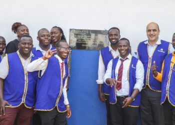 Majid Al Futtaim Hypermarkets Uganda Ltd staff handover 3 classroom blocks to the Director and Founder of The Noah's Ark Village - Ms Nakato Angella