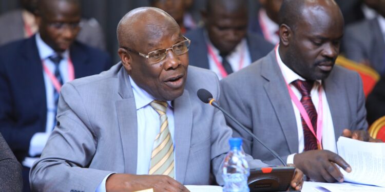 The Minister of State for Energy, Hon. Sidronious Okaasai (left) appearing before the Committee on Budget on Tuesday 5 December 2023