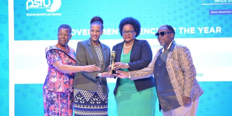 Hon. Victoria Sekitoleko, Chairperson, Uganda Agribusiness Alliance, Freda Bwiizi, Director Planning & Res...rar General, Mercy K. Kainobwisho & Daniel Kazibwe, Chairman, National Cultural Forum displaying URSB's best agency award