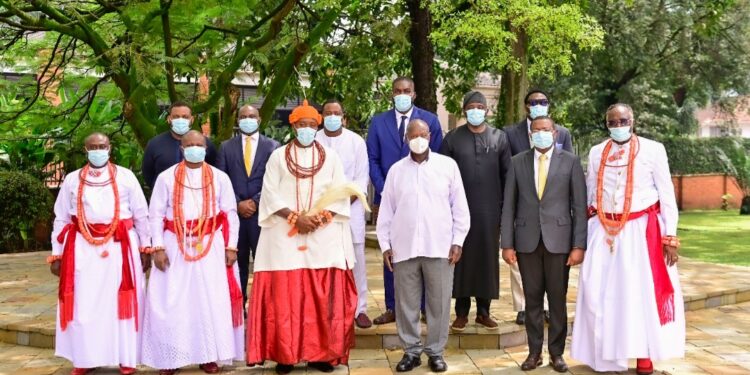 President Museveni with King Ogiame Atuwatse III and his delegation in a group photo