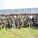 Commander Special Forces Command Brig. Gen. David Mugisha in a group photo with SFC commandos after a debrief of the successful operations for the NAM and the G77+China summit that Uganda hosted in in January, this was at the Sera-Kasenyi Training School on the 27th January 2024. Photo by PPU/Tony Rujuta.