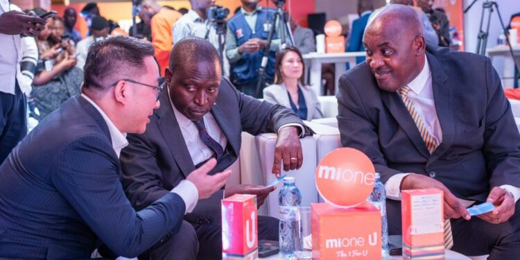 From left: Ben Yu, the Mione Brand Representative in Uganda, Hon. David Bahati & Dr. Chris Baryomunsi