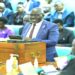 Gen. Katumba Wamala tabling the aviation Bill for First Reading. The minister is counting on MPs to avert the looming crisis