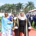 Speaker Among (R) with her Rwandese counterpart, Rt Hon Donatille Mukabalisa lead other presiding officers to the plenary area after the taking of the official photo