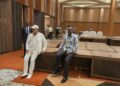 Sudhir and Frank Tumwebaze oversee last touches on the hall ahead of the summits