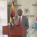 Hon. Tom Butiime addressing Journalists at the Uganda Media Centre on Tuesday