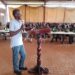 Dr Charles Michael Karimbaka making a presentation to the UPDF officers.