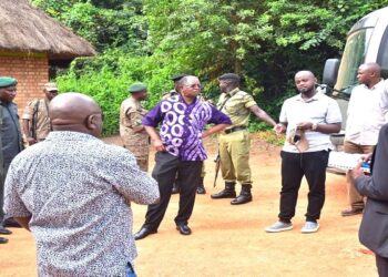 MPs on the committee (right) interacting with officials from the Lake Mburo National Park during their oversight visit