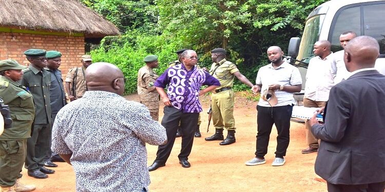 MPs on the committee (right) interacting with officials from the Lake Mburo National Park during their oversight visit