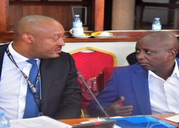 UIA Director General, Robert Mukiza (left) and another UIA staff during the committee meeting on Tuesday, 20 February 2024