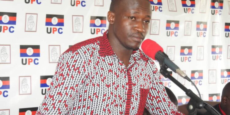 Muzeyi Faizo addressing Journalists at UPC Head Office in Kampala on Wednesday