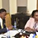 Finance Committee Chairperson, Hon. Amos Kankunda (left) and the Director for Information at NPC, Stella Kigozi, during the committee meeting on Monday 26 February 2024