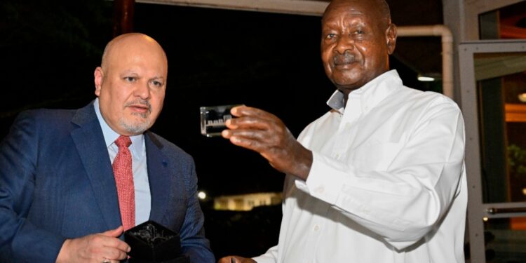 Mr. Karim Khan with President Museveni