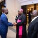 Archbishop Paul Ssemwogerere (centre) welcoming the Deputy Speaker, Thomas Tayebwa, at the Memorial Lecture held at Hotel Africana on Thursday, 07 March 2024