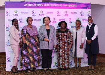 Dr. Maggie Kigozi (3rd Left] is flanked by Women entrepreneurs at Hotel Africana on Thursday