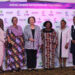 Dr. Maggie Kigozi (3rd Left] is flanked by Women entrepreneurs at Hotel Africana on Thursday