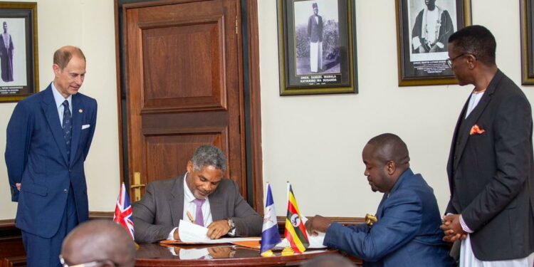 William Blick, Chairman Board of Trustees signed on behalf of the Program - Uganda Chapter and Omuk. Sebuwufu Roland - Chief Executive, Buganda Investments and Commercial Undertakings signed on behalf of Buganda Kingdom.