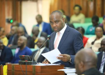 The Minister of State for Finance (General Duties), Hon. Henry Musasizi, presenting the national budget and accompanying documents for the next financial year during the House sitting on Thursday 28 March 2024