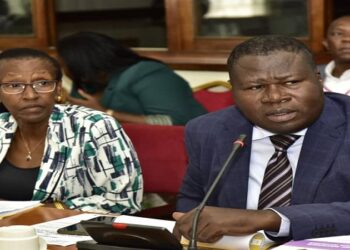 The Permanent Secretary, Ministry of Defence, Rosette Byengoma (left) and Minister Jacob Oboth appearing before the Committee on Defence and Internal Affairs on Tuesday 26 March 2024