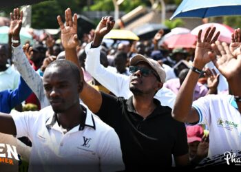 Men worshiping at Kololo. Photo @Phanerookampala