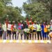 Riders and walkers paint the Jinja main zebra crossing
