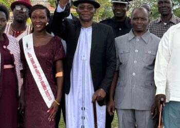 Won Nyaci elect me Lango HRH Eng Dr Michael Moses Odongo Okune and Miss Tourism Northern Uganda during the Green Lango function launched in Amolatar District