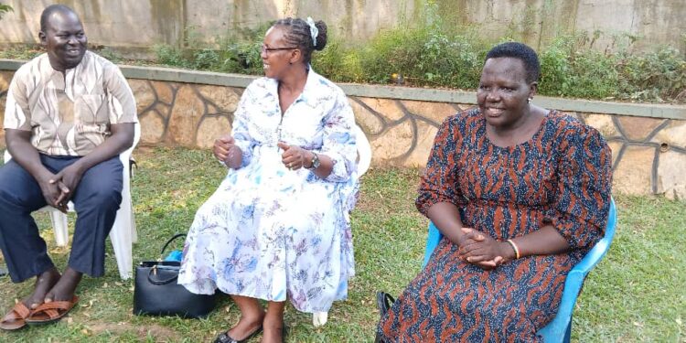 Willy Omodo Omodo with RDCs Josephine Omara Olili of Kole and Gillian Akullo of Alebtong shortly after taking COVID 19 tests at State House Land Department a day before the Entebbe State House meeting