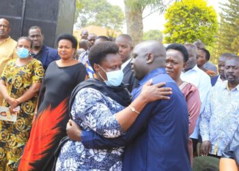 The Vice President with Hajji Faruk Kirunda at the burial ceremony of the Late Gladys Aliyinza