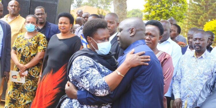 The Vice President with Hajji Faruk Kirunda at the burial ceremony of the Late Gladys Aliyinza