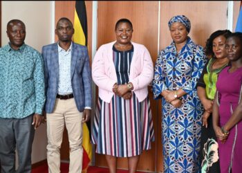 Hon. Babalanda with the Queen of Rwenzururu in a group photo