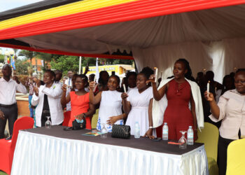 Some of the participants at the International Candlelight Day at the National Records and Archives centre in Kampala on Monday
