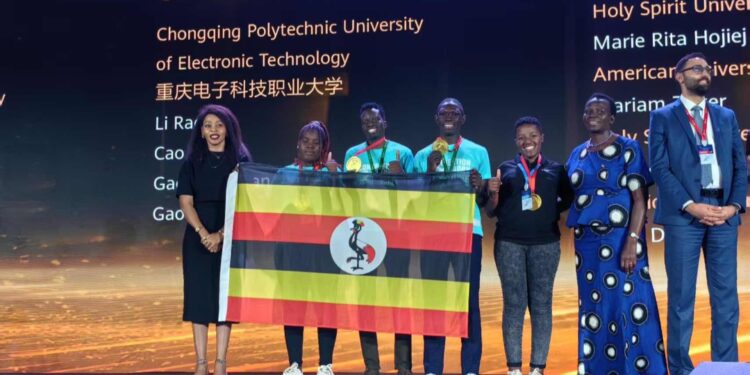 The victorious Ugandan scholars being awarded by The Ugandan Ambassador in Guangzhou China, Ms. Judyth Nsababera and the Permanent Secretary Ministry of Education and Sport, Dr. Kedrace Turyagenda who represented the First Lady and Minister of Education
