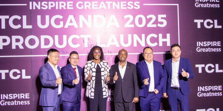 First left Luke Wang General Manager Tian Tang Group and CEO Uhome holdings Limited, second TCL boss Alvin Wang, Minister Anite, CEO Simba Group Patrick Bitature and other investors