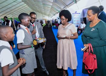 Dr. Musenero (Middle), Col. Nakalema, Dr. Bruce Kirenga with young innovators