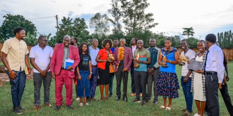 The Won Nyaci in a group photograph with Lango Film Makers during a recent engagement.