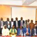 Hajji Kakande in a group photo with Officials from the office of the President and RDCs