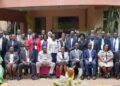 Hajji Kakande and Ms. Nakyobe with administrative officers