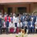 Hajji Kakande and Ms. Nakyobe with administrative officers
