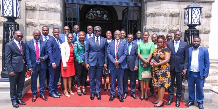 Makerere Vice Chancellor Prof Nawangwe receives a high powered delegation from @stanbicug
 led by Executive Director Samuel Fredrick Mwogeza.