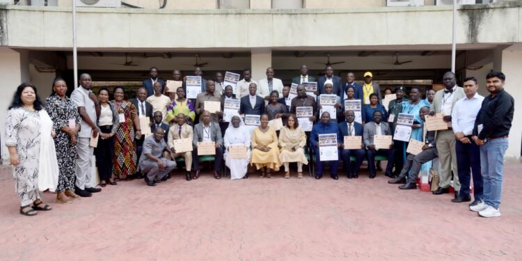 The participants in a group photo with the High Commissioner Prof. Kikafunda and the management of NIESBUD