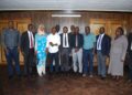 Members of the Southern Division Area Land Committee pose for a group photo with the Jinja City leadership