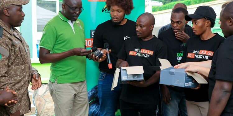 Viva! Uganda officials handover Cameras to the Bwindi area warden