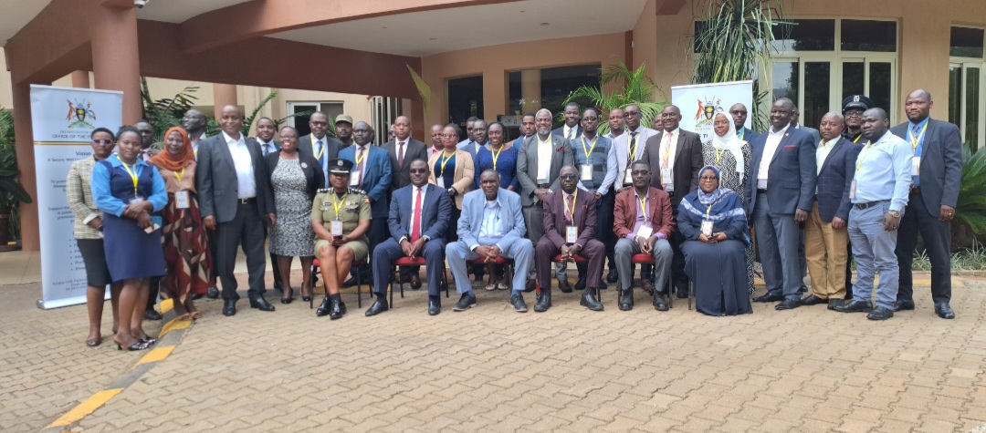 Hajji Kakande in a group photo with Policy Analysts