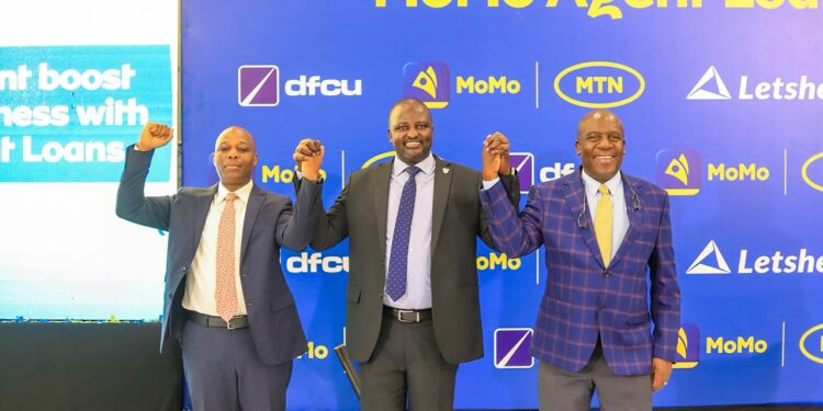 Together for financial inclusion, CEOs' Giles Germany Aijukwe (Letshego Uganda), Richard Yego (MTN MoMo) and Charles Mudiwa (dfcu Bank Uganda) at the launch of the MoMo Agent Loans Marketplace at Protea Kololo